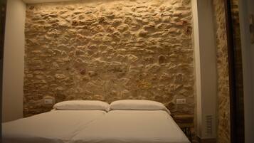 2 slaapkamers, een strijkplank/strijkijzer, beddengoed