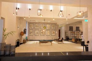 Chambre Deluxe, balcon, vue ville | Coin séjour