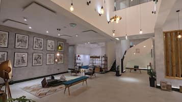 Deluxe-huone, parveke, kaupunkinäköala | Oleskelualue