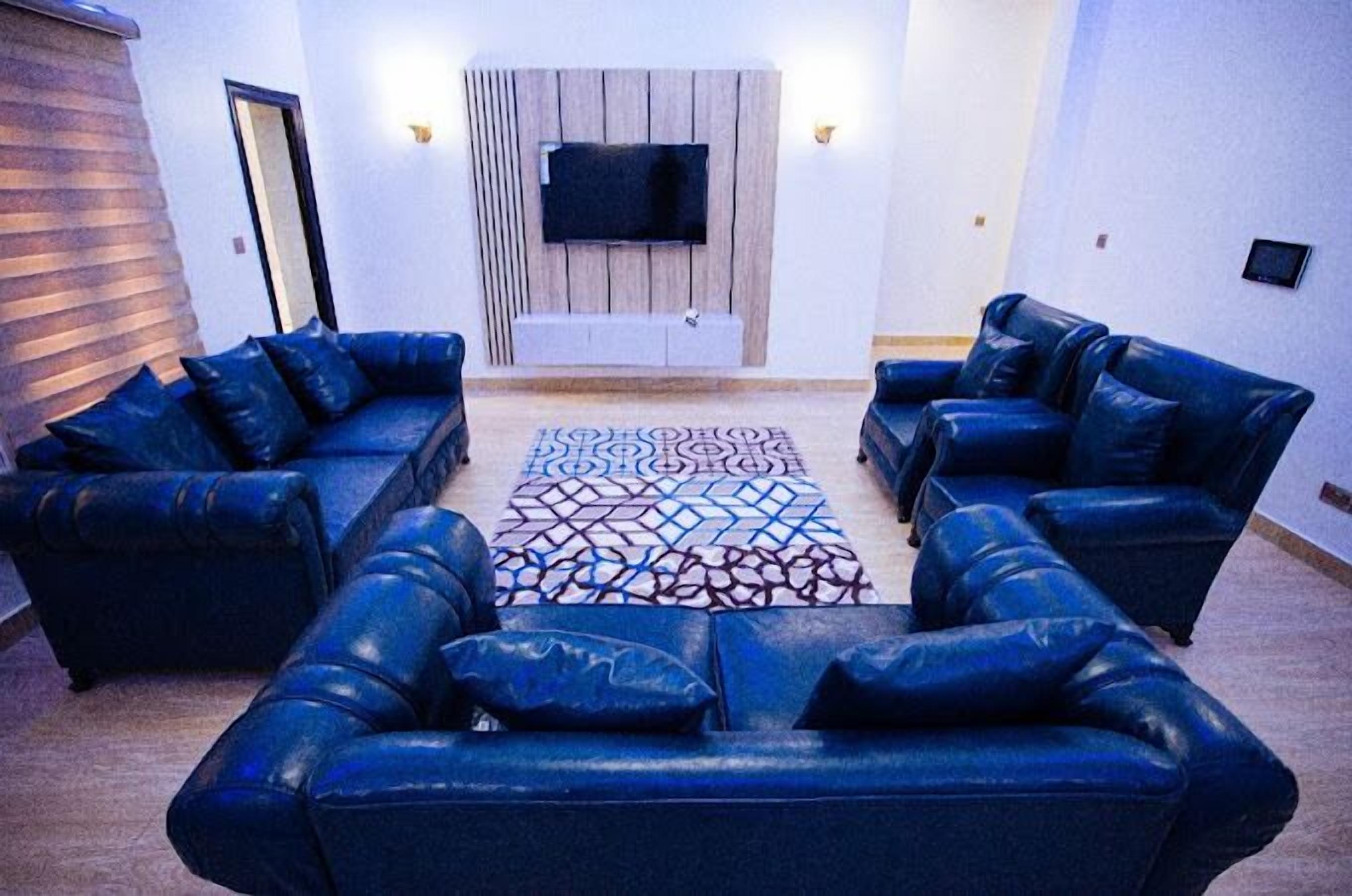 Quarto família, sacada, vista para a cidade | Área de estar