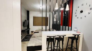 Fer et planche à repasser, draps fournis