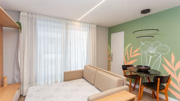 Estúdio | Área de estar | Smart TV 43 polegadas com canais digitais