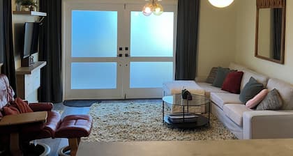 Downtown Evergreen Walk out apartment, private drive/ deck, centrally located