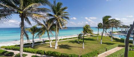 On the beach, sun loungers, beach towels