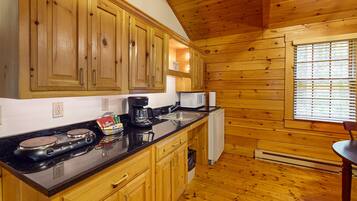 Microwave, coffee/tea maker, toaster, cookware/dishes/utensils