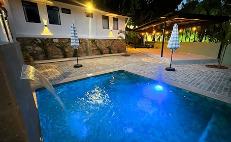 Outdoor pool, open 9:00 AM to 9:00 PM, pool umbrellas, sun loungers