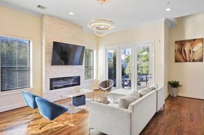 Smart TV, fireplace, books