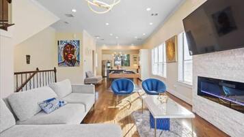 Smart TV, fireplace, books