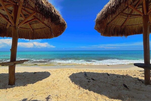 On the beach, sun loungers