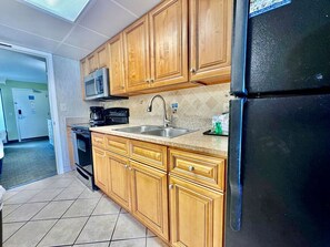 Microwave, oven, stovetop, coffee/tea maker