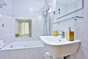 Hair dryer, bidet, towels, toilet paper
