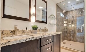 Shower, hair dryer, bidet, towels