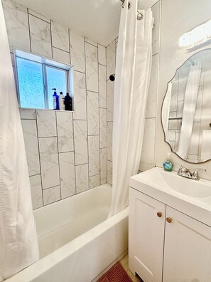 Hair dryer, towels, soap, shampoo