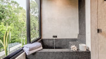 Deluxe Villa, Patio, Poolside | Bathroom | Separate bathtub and shower, hair dryer, towels, soap