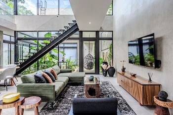 12-inch flat-screen TV with satellite channels at ANANA Casa Karmond