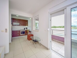 Fridge, microwave, oven, cookware/dishes/utensils