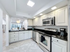 Fridge, microwave, oven, stovetop - Modern Coastal Condo 3 miles to Siesta Key Beach – Sleeps 6!  (Sarasota)