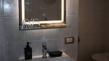 Hair dryer, bidet, towels, soap