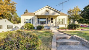 A two-story house with a front porch, a garage, and a driveway. - < 1 Mi to Dwtn: Valparaiso Family Home (Valparaiso)
