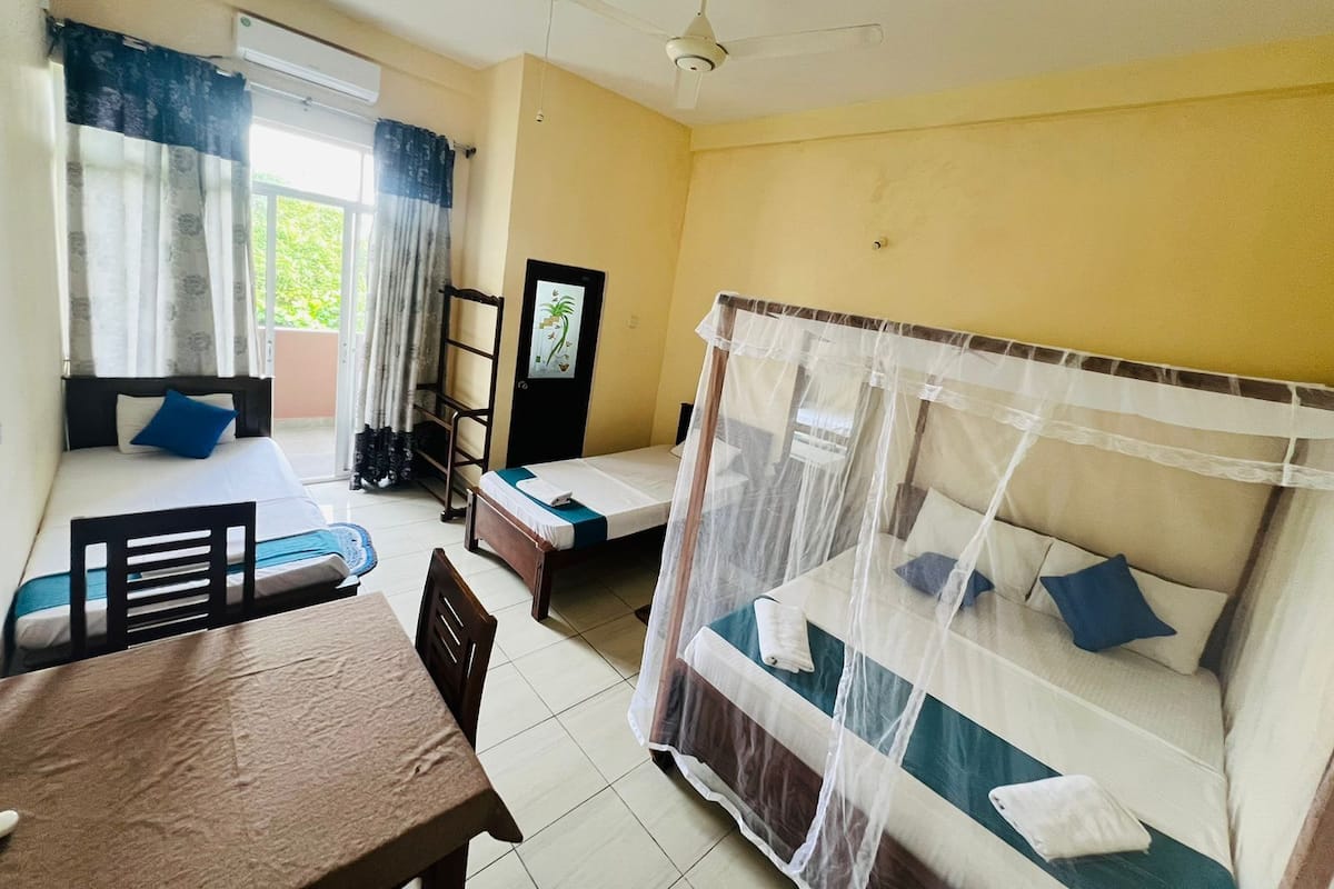 Comfort Suite, 1 Bedroom, Balcony | 1 bedroom, individually furnished, desk, laptop workspace