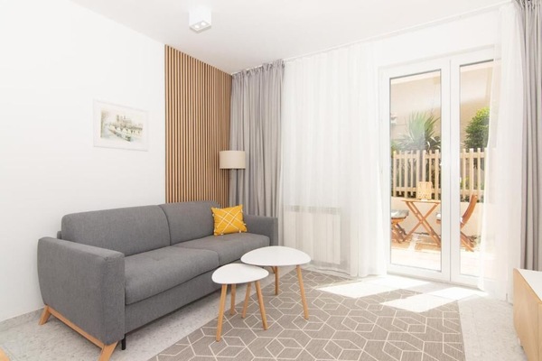 Superior Apartment, 1 Bedroom, Courtyard View | Living area | Flat-screen TV