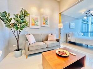 Comfort Condo, City View | Living area - One Uptown Residence Near St Lukes (Taguig)