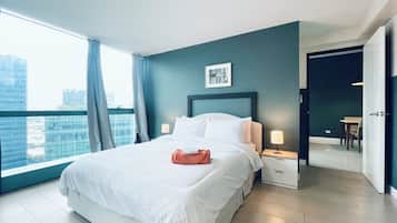 Deluxe Condo, City View | 1 bedroom, desk, laptop workspace, free WiFi