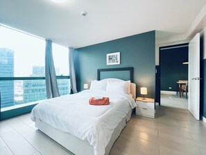 Deluxe Condo, City View | 1 bedroom, desk, laptop workspace, free WiFi