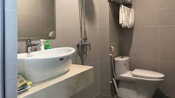 Shower, free toiletries, hair dryer, slippers