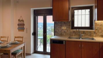 House, 2 Bedrooms, Sea View | Private kitchen | High chair