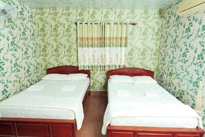 Standard Quadruple Room, City View | 1 bedroom, iron/ironing board, free WiFi
