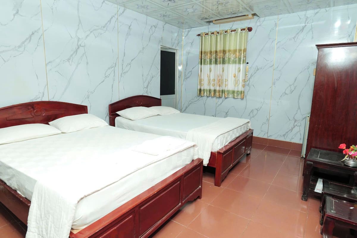 Standard Quadruple Room, City View | Iron/ironing board, free WiFi