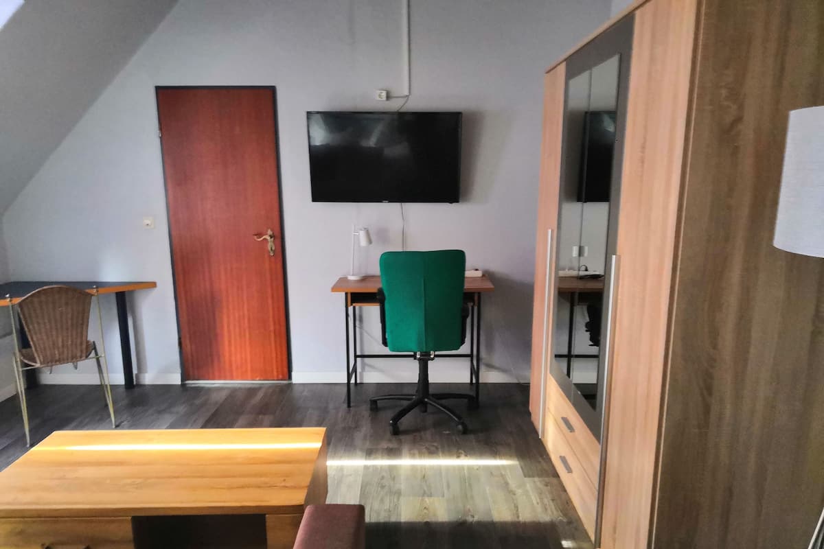 Desk, laptop workspace, blackout drapes, iron/ironing board (on request)