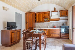 Family Villa, 3 Bedrooms, 2 Bathrooms, Mountainside (Tenuta Guarini Trulli On Selva Di) | Private kitchen | Fridge, oven, stovetop, dishwasher