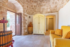 Family Villa, 3 Bedrooms, 2 Bathrooms, Mountainside (Tenuta Guarini Trulli On Selva Di) | Living room | Flat-screen TV, fireplace
