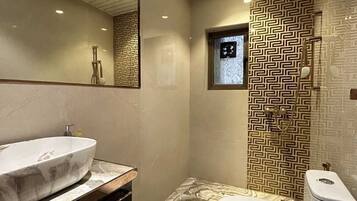 Shower, towels, soap, shampoo