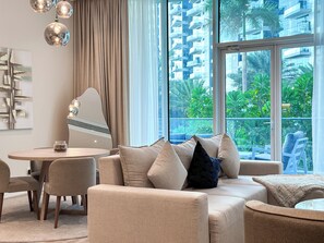 Luxury Apartment, 1 Bedroom, Garden View, Beachfront | Living area - Resort Style Living - Oceana Residences (Dubai)