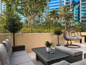 Luxury-Apartment, 1 Schlafzimmer, Gartenblick, am Strand | Terrasse/Patio
