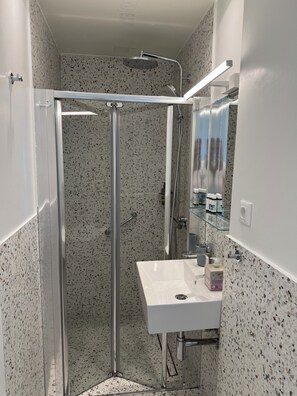 Hair dryer, towels, soap, shampoo