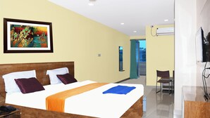 Executive Double Room | Bathroom | Shower, rainfall showerhead, slippers, towels - Sai Baba Palace Lodging and Boarding (Bidar)