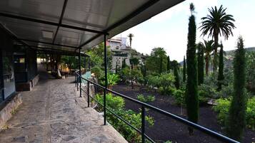 Apartment, 1 Bedroom, Patio, Garden View | Property grounds