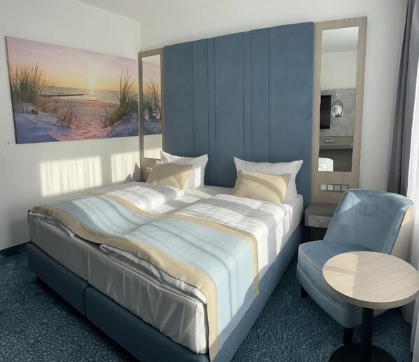 Premium bedding, pillow-top beds, in-room safe, blackout curtains