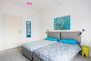 1 habitación, tabla de planchar con plancha, wifi y ropa de cama 