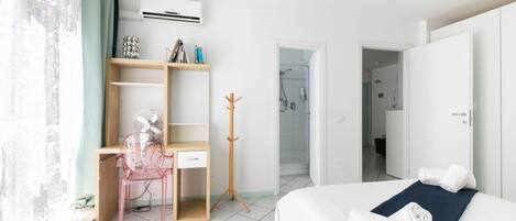 1 slaapkamer, een strijkplank/strijkijzer, wifi, beddengoed