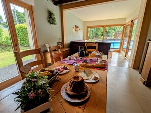 Dining - Spacious room with balcony and heated pool access (Anould)