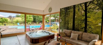 Spacious room with balcony and heated pool access