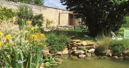 Charming house in orchard heart with fireplace, secret garden and children's games