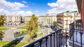 A view of a cityscape with multi-story buildings, a playground, and a roundabout. - Eclectic Apartment 2 in Vasto by Wonderful Italy (Naples)