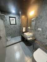 Shower, towels, soap, shampoo