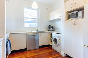 Fridge, microwave, oven, stovetop - Stylish Art Deco 2 Bed Apt in Edgecliff (Edgecliff)